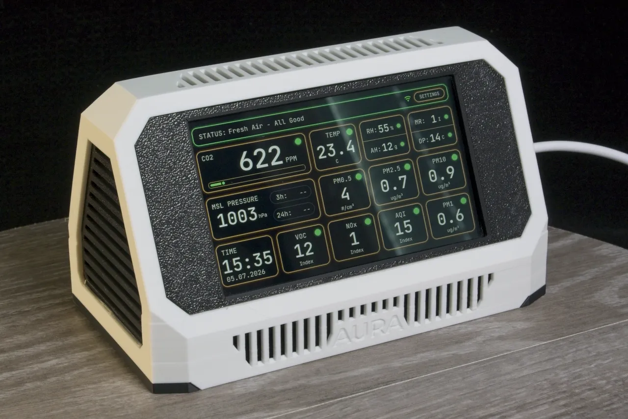 Aura original case (white) — front three-quarter view, live readings on screen